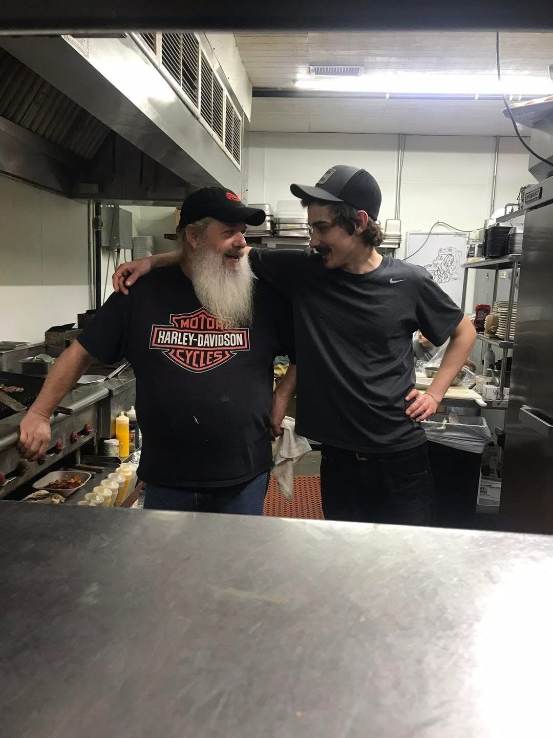 Woodshed server carrying two meals